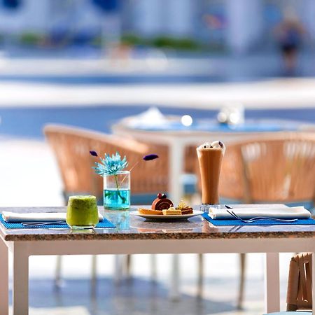 Pickalbatros Blu Spa Resort - Adults Friendly 16 Years Plus- Ultra All-Inclusive Hurghada Exterior photo A table at a restaurant